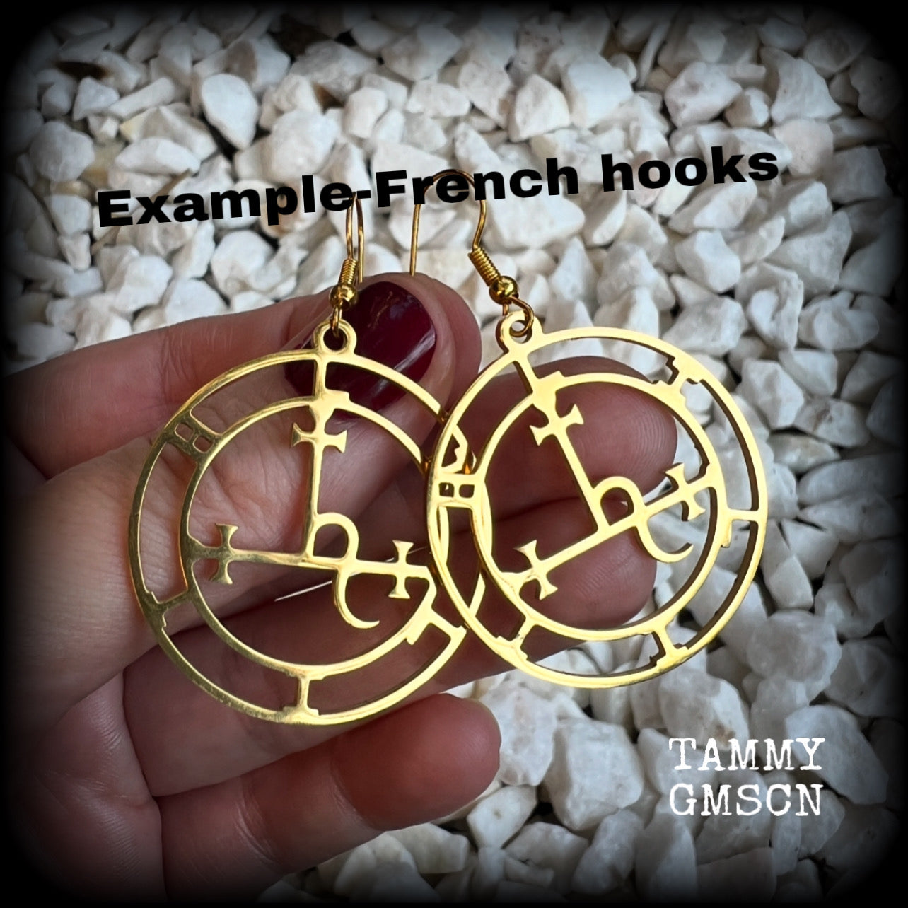 These gorgeous gold stainless steel earrings feature the Sigil of Lilith as it appears in The Lesser Key of Solomon, and are lovely and light weight, weighing only a few grams each, and measure just on 5.5cms from tip to tip.

This pair has been made with french hooks, suitable for pierced ears.