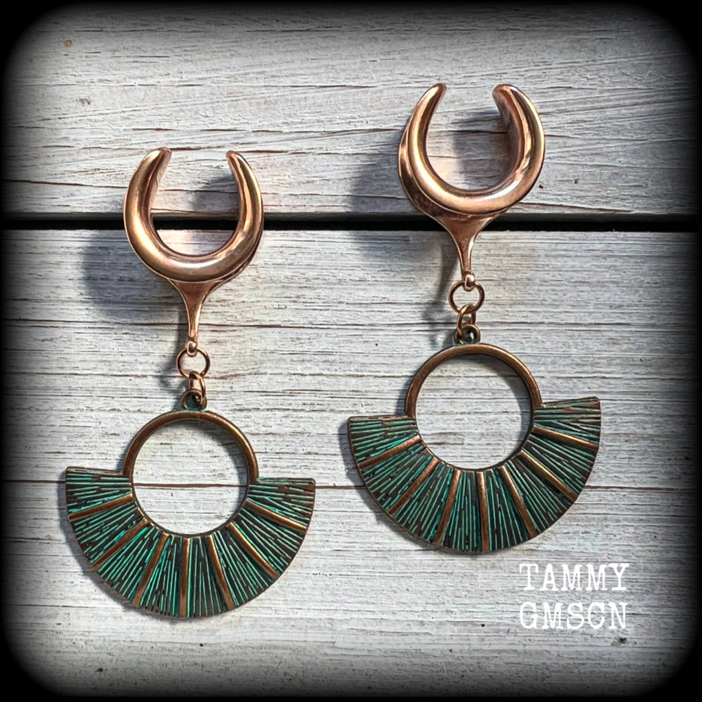 Inspired by Ishtar, Mesopotamian Goddess of love, beauty, sex and war, these beautiful patina and rose gold battle shield gauged earrings weigh approx 8 grams a piece, and measure just under 7 cms from tip to tip.

This pair have been made on 5/8” gauge (16mm) surgical steel cradles, suitable for stretched lobes.