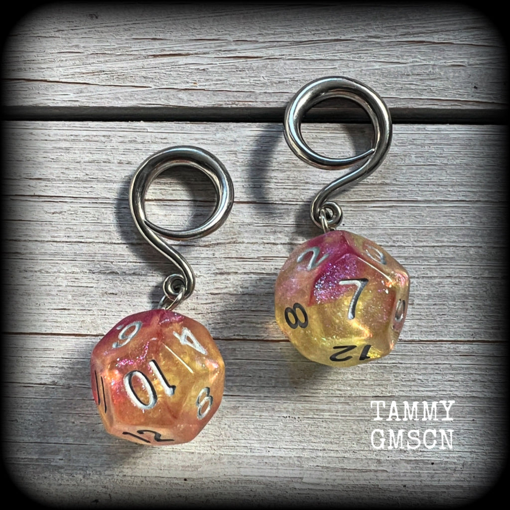 Featuring a pair of gorgeous shimmery pink and yellow gaming die, these awesome gauged earrings measure 5 cms from tip to tip, and weigh only 8 grams grams each.

This pair have been made on 6 gauge (4mm) surgical steel full curl hooks, to be worn in stretched lobes.