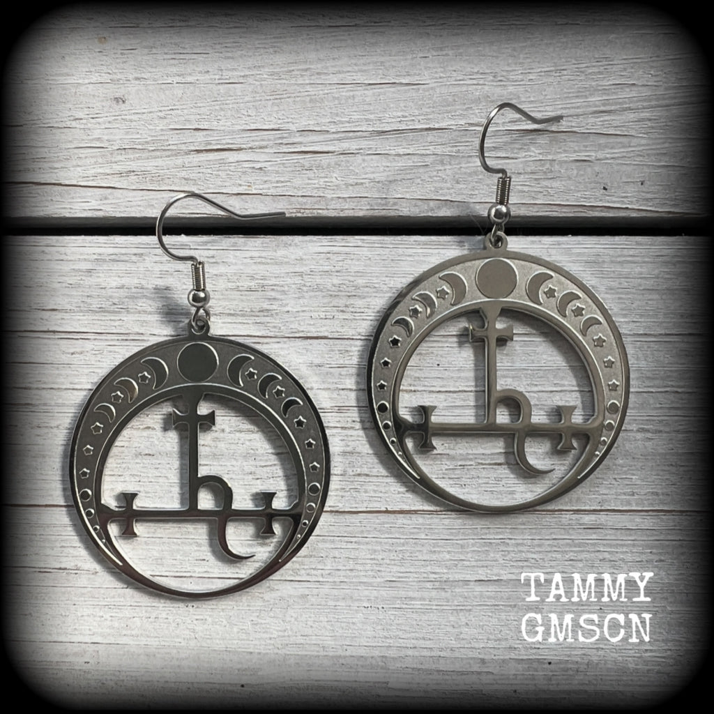 These gorgeous stainless steel earrings feature the Sigil of Lilith surrounded by moon phases, lovely and light weight at only 5 grams each, and measure just over 5.5cms from tip to tip.


This pair have been made with stainless steel french hooks, to be worn in pierced ears.
