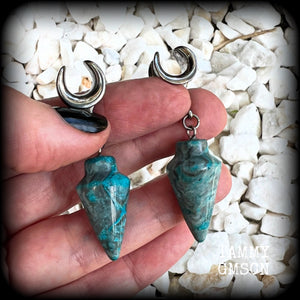 Featuring gorgeous one of a kind dusty blue lace agate pendulums, these earrings weigh in at approx 9 grams a piece, and are nice and dangly at just on 5.5cms from tip to tip.

This pair has been made on 00 gauge (10mm) surgical steel cradles, to be worn in stretched lobes.