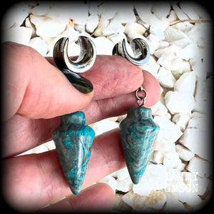 Featuring gorgeous one of a kind dusty blue lace agate pendulums, these earrings weigh in at approx 9 grams a piece, and are nice and dangly at just on 5.5cms from tip to tip.

This pair has been made on 00 gauge (10mm) surgical steel cradles, to be worn in stretched lobes.