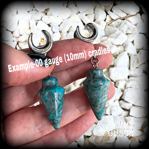 Featuring gorgeous one of a kind dusty blue lace agate pendulums, these earrings weigh in at approx 9 grams a piece, and are nice and dangly at just on 5.5cms from tip to tip.

This pair has been made on 00 gauge (10mm) surgical steel cradles, to be worn in stretched lobes.