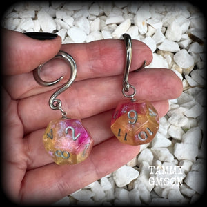 Featuring a pair of gorgeous shimmery pink and yellow gaming die, these awesome gauged earrings measure 5 cms from tip to tip, and weigh only 8 grams grams each.

This pair have been made on 6 gauge (4mm) surgical steel full curl hooks, to be worn in stretched lobes.