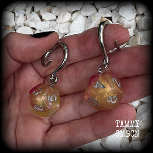 Featuring a pair of gorgeous shimmery pink and yellow gaming die, these awesome gauged earrings measure 5 cms from tip to tip, and weigh only 8 grams grams each.

This pair have been made on 6 gauge (4mm) surgical steel full curl hooks, to be worn in stretched lobes.
