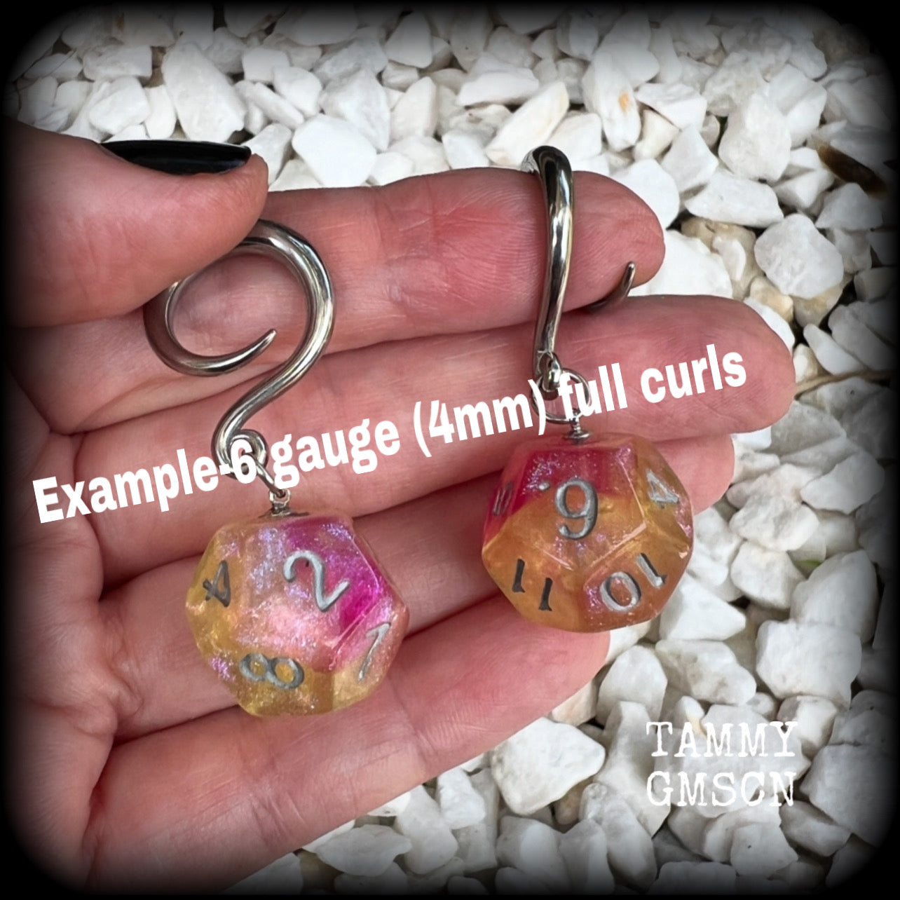 Featuring a pair of gorgeous shimmery pink and yellow gaming die, these awesome gauged earrings measure 5 cms from tip to tip, and weigh only 8 grams grams each.

This pair have been made on 6 gauge (4mm) surgical steel full curl hooks, to be worn in stretched lobes.