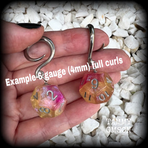 Featuring a pair of gorgeous shimmery pink and yellow gaming die, these awesome gauged earrings measure 5 cms from tip to tip, and weigh only 8 grams grams each.

This pair have been made on 6 gauge (4mm) surgical steel full curl hooks, to be worn in stretched lobes.