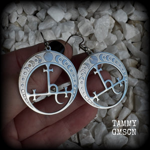 These gorgeous stainless steel earrings feature the Sigil of Lilith surrounded by moon phases, lovely and light weight at only 5 grams each, and measure just over 5.5cms from tip to tip.


This pair have been made with stainless steel french hooks, to be worn in pierced ears.

