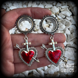 These gorgeous tunnel earrings feature beautiful antique silver and red enamel hearts pierced by silver arrows, are nice and lightweight, weighing only 12 grams each and measure approx 7cms from tip to tip.  This pair has been made with 3/4" (19mm) gauge ornate surgical steel screw fit tunnels.