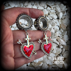 These gorgeous tunnel earrings feature beautiful antique silver and red enamel hearts pierced by silver arrows, are nice and lightweight, weighing only 12 grams each and measure approx 7cms from tip to tip.  This pair has been made with 3/4" (19mm) gauge ornate surgical steel screw fit tunnels.