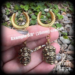 These gauged earrings have been made for stretched lobes featuring a classic Japanese warrior demon face. These are available on  four different style hooks from 6mm up to 30mm.