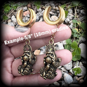 Brass foo dog ear weights featuring a chinese coin in its mouth, made with 16mm surgical steel cradles for stretched lobes