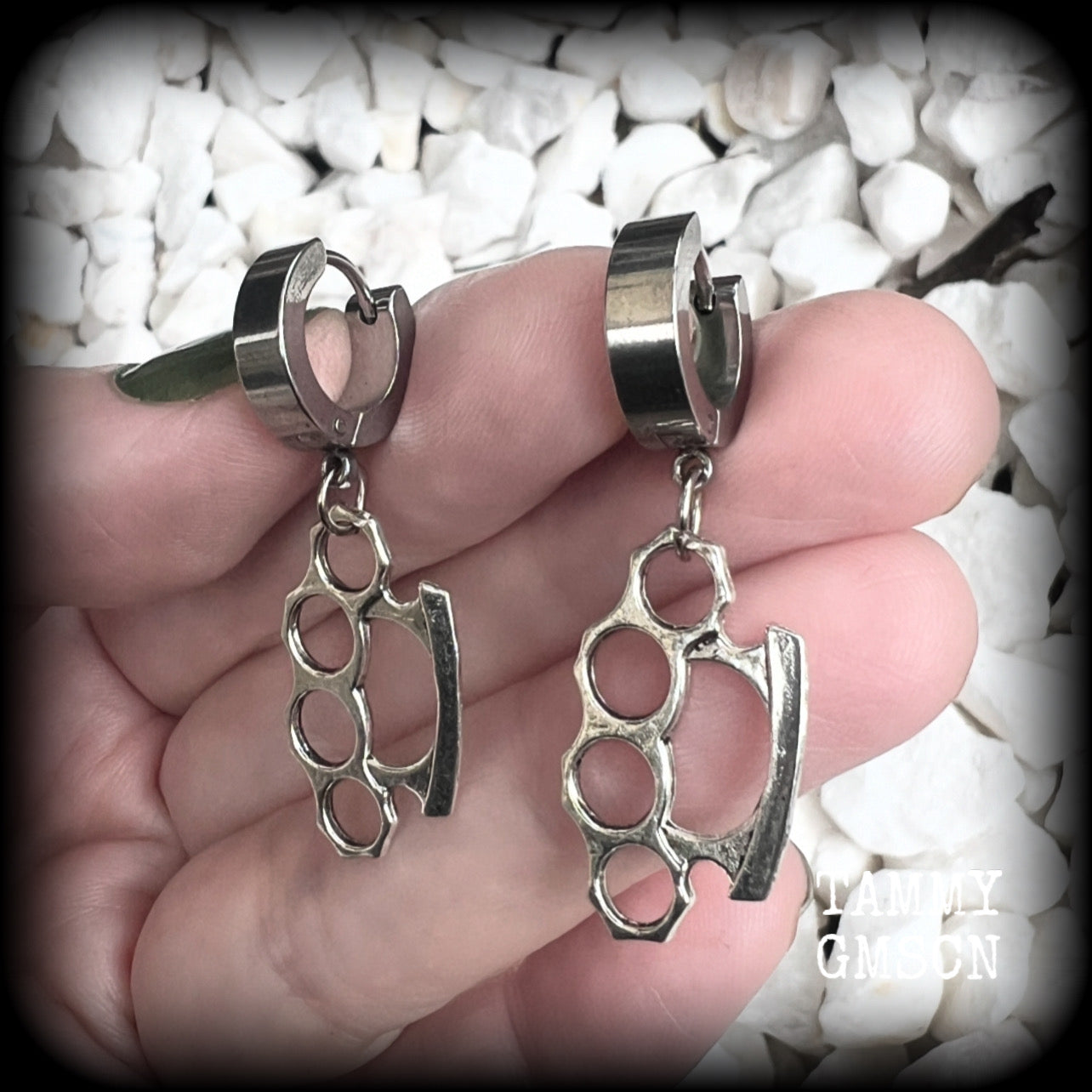 These awesome earrings feature antique silver brass knuckles, are nice and lightweight at approx 3 grams each, and measure in at just on 4cms from tip to tip.

This pair have been made on stainless steel huggie ear cuffs, suitable for pierced ears.