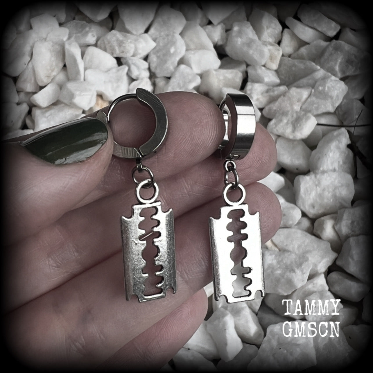These awesome earrings feature antique silver razor blades, are nice and lightweight at approx 3 grams each, and measure in at just over 4cms from tip to tip.

This pair have been made on stainless steel huggie ear cuffs, suitable for pierced ears.