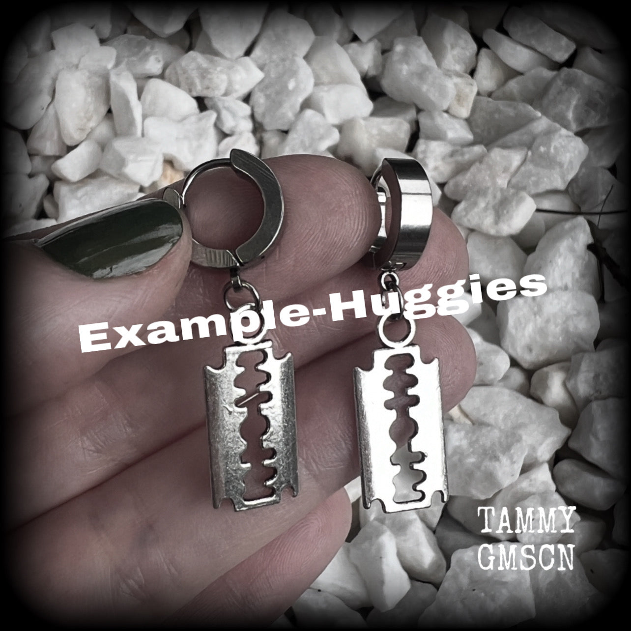These awesome earrings feature antique silver razor blades, are nice and lightweight at approx 3 grams each, and measure in at just over 4cms from tip to tip.

This pair have been made on stainless steel huggie ear cuffs, suitable for pierced ears.