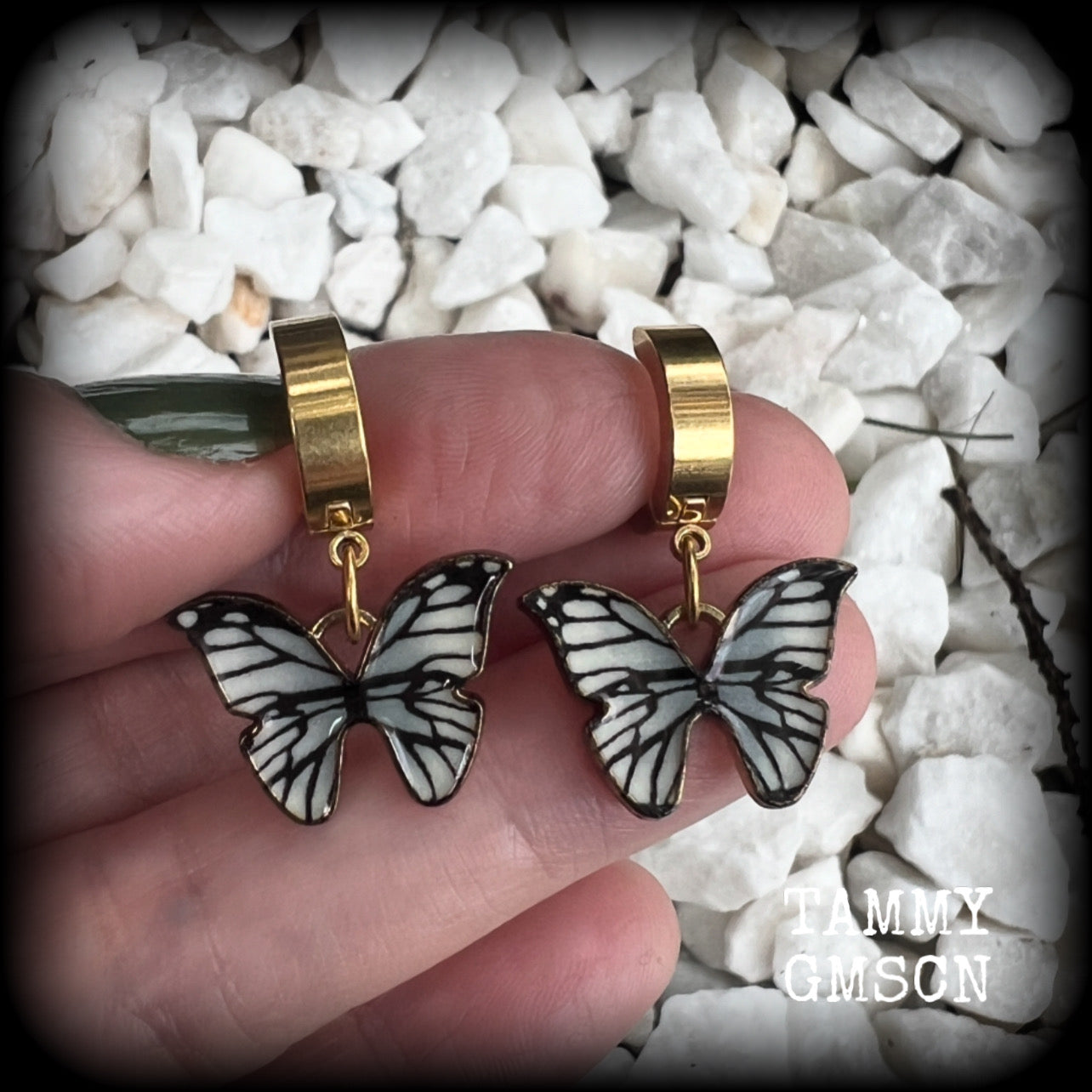 These awesome earrings feature antique gold and enamel blue butterflies, are nice and lightweight at only a few grams each, and measure in at approx 3cms from tip to tip.

This pair have been made on stainless steel huggie ear cuffs, suitable for pierced ears.