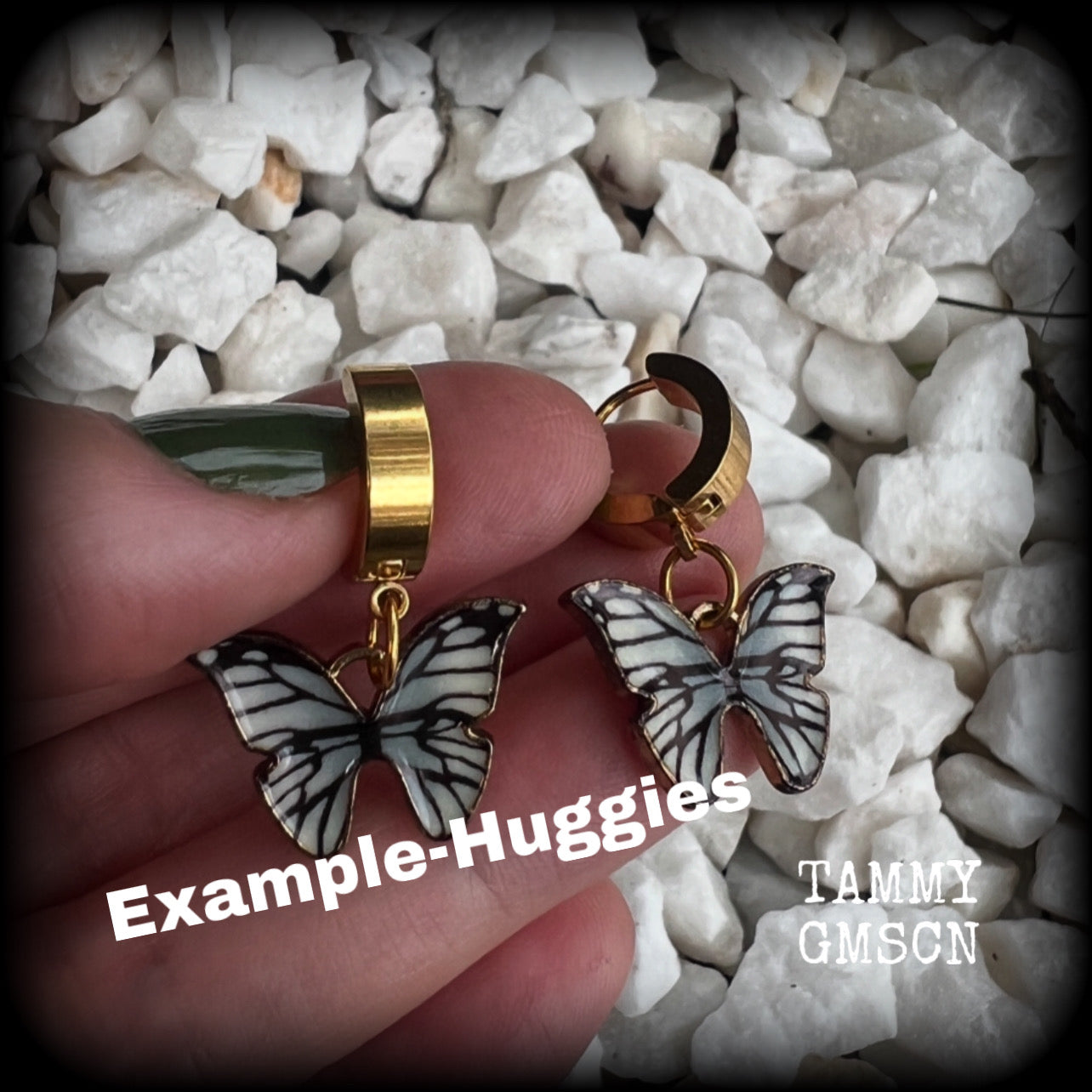 These awesome earrings feature antique gold and enamel blue butterflies, are nice and lightweight at only a few grams each, and measure in at approx 3cms from tip to tip.

This pair have been made on stainless steel huggie ear cuffs, suitable for pierced ears.