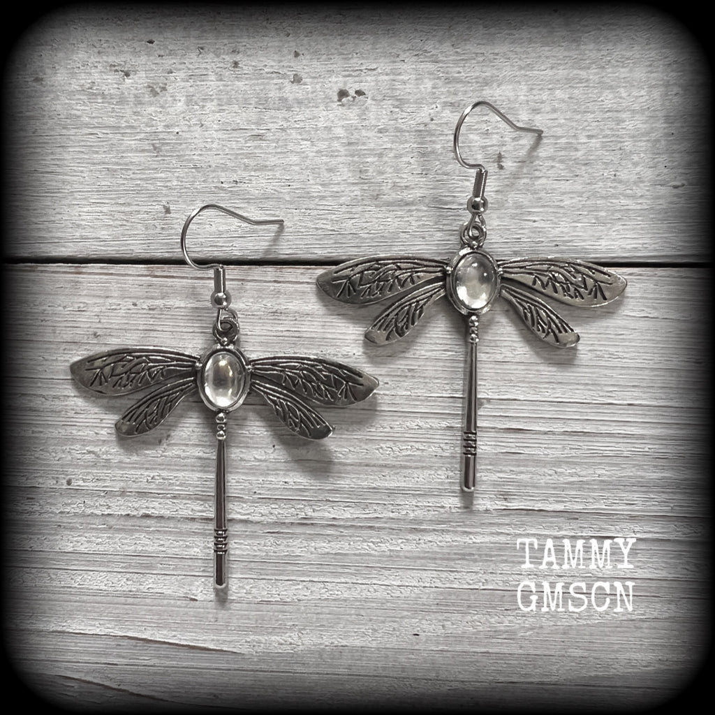 This is a pair of beautuful antique silver dragonfly earrings with translucent cabachon in the body of the dragonfly. This pair has been made with stainless steel french hooks but you can choose from a range of different hooks.