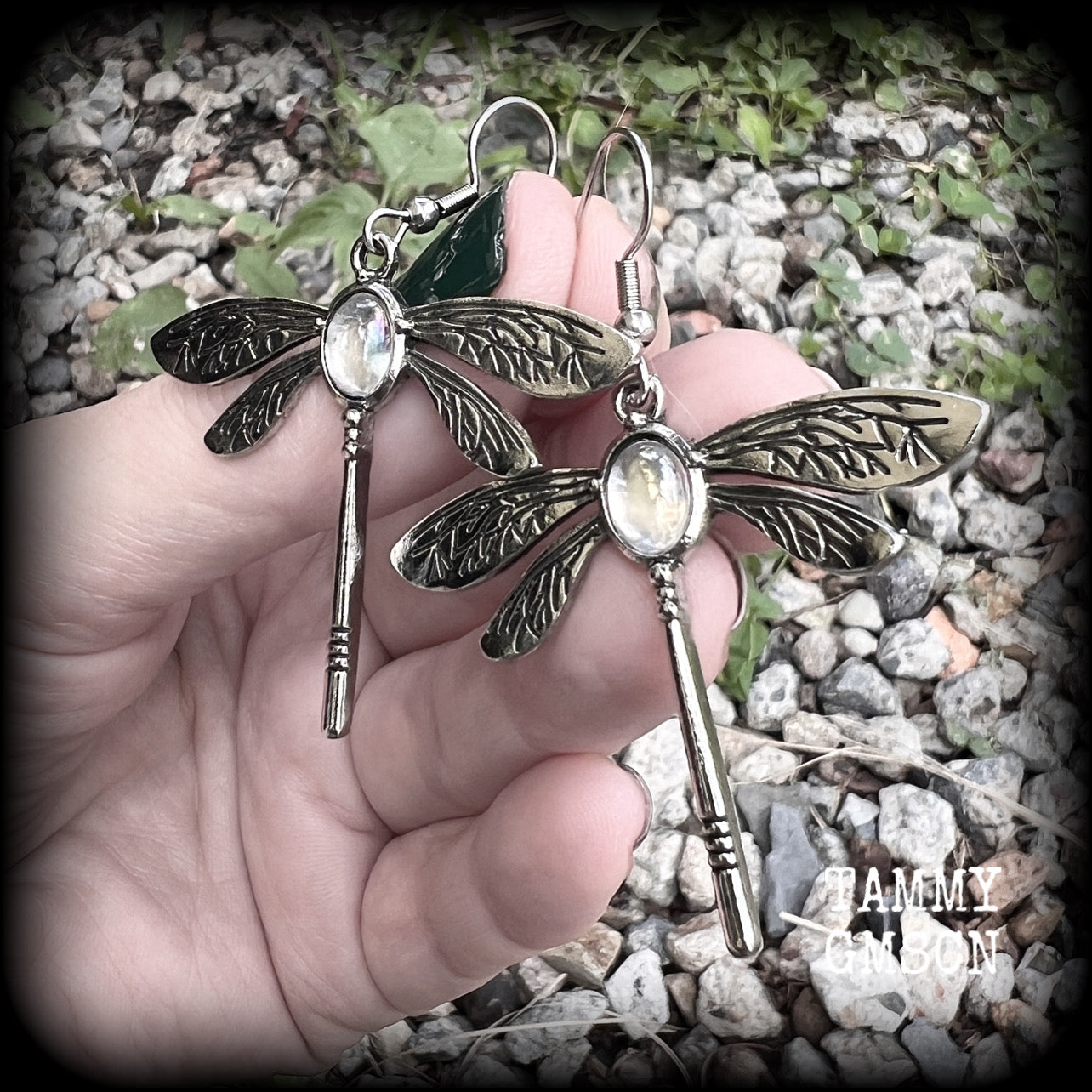 This is a pair of beautuful antique silver dragonfly earrings with translucent cabachon in the body of the dragonfly. This pair has been made with stainless steel french hooks but you can choose from a range of different hooks.