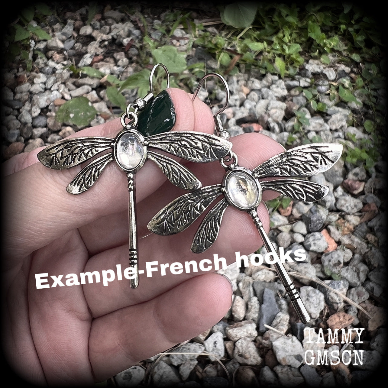 This is a pair of beautuful antique silver dragonfly earrings with translucent cabachon in the body of the dragonfly. This pair has been made with stainless steel french hooks but you can choose from a range of different hooks.