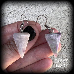 These earrings are made with beautiful milky white and dusty purple amethyst gemstones, nice and light weight at approx 5 grams each, and measure 5 cms from tip to tip.
This pair has been made with stainless steel french hooks, suitable for pierced ears.