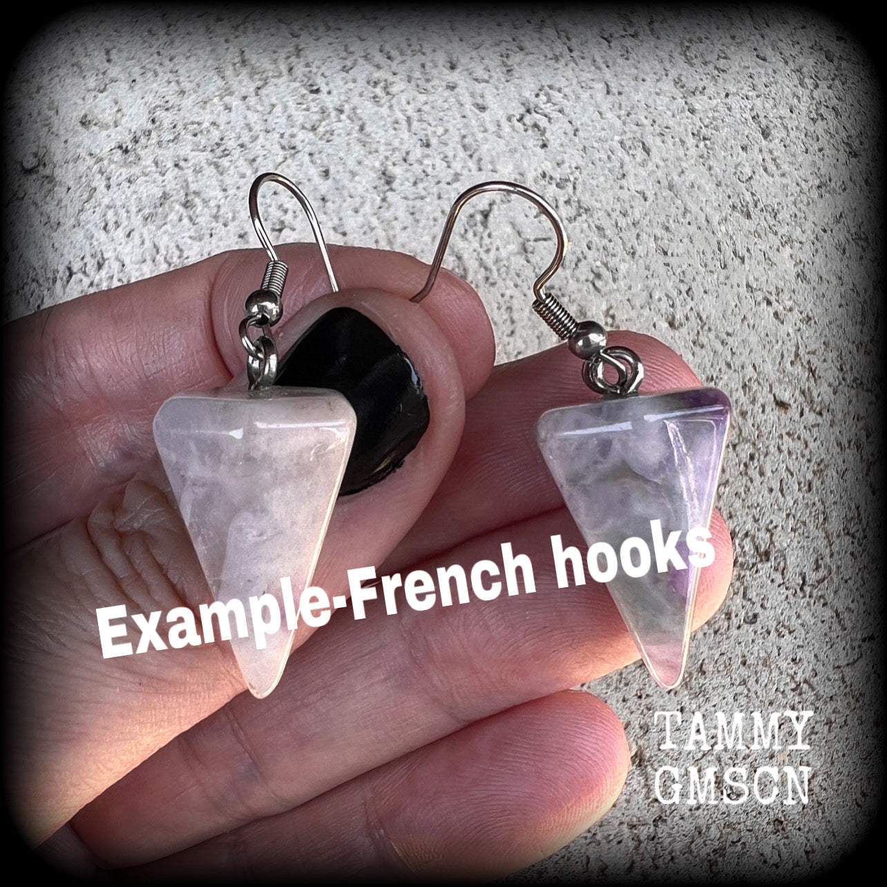 These earrings are made with beautiful milky white and dusty purple amethyst gemstones, nice and light weight at approx 5 grams each, and measure 5 cms from tip to tip.
This pair has been made with stainless steel french hooks, suitable for pierced ears.