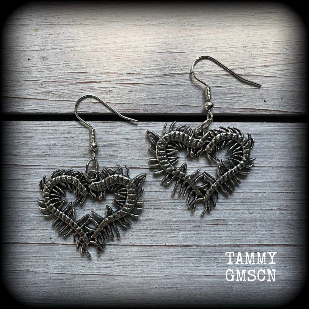 These awesome earrings feature lightweight love heart centipedes, weighing only 5 grams each and measuring approx 5cms from tip to tip.

This pair have been made on stainless steel french hooks, to be worn through pierced ears.