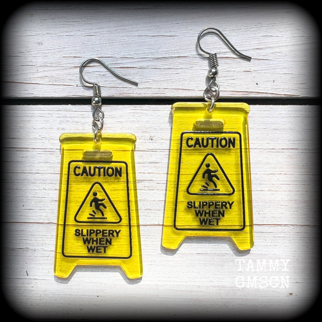 These awesome fluoro yellow acrylic ‘Slippery when wet’ sign earrings measure in at just on 7cms, are nice and light weighing only 4 grams each.

This pair has been made with stainless steel french hooks, for pierced ears.