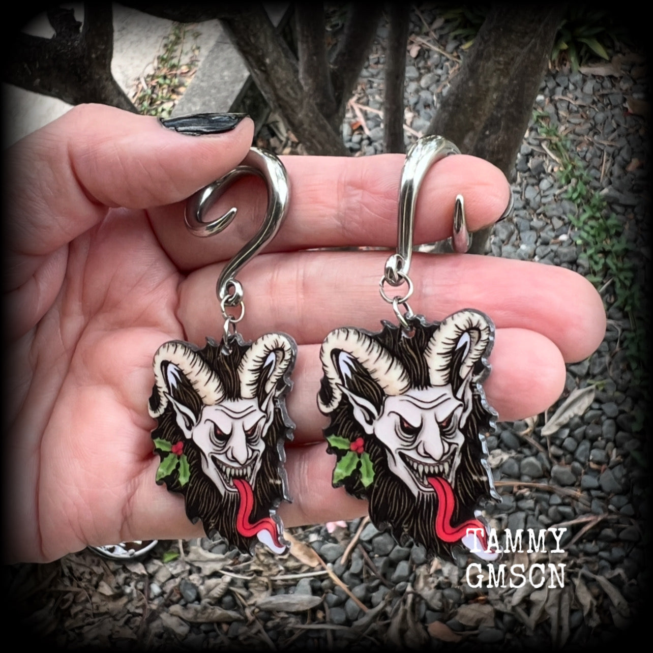 Featuring lightweight acrylic Krampus charms, these awesome gauged earrings weigh approx 10 grams each, and are lovely and dangly at just on 7cms from tip to tip.  This pair has been made on 2 gauge (6mm) surgical steel full curl hooks, to be worn in stretched lobes.