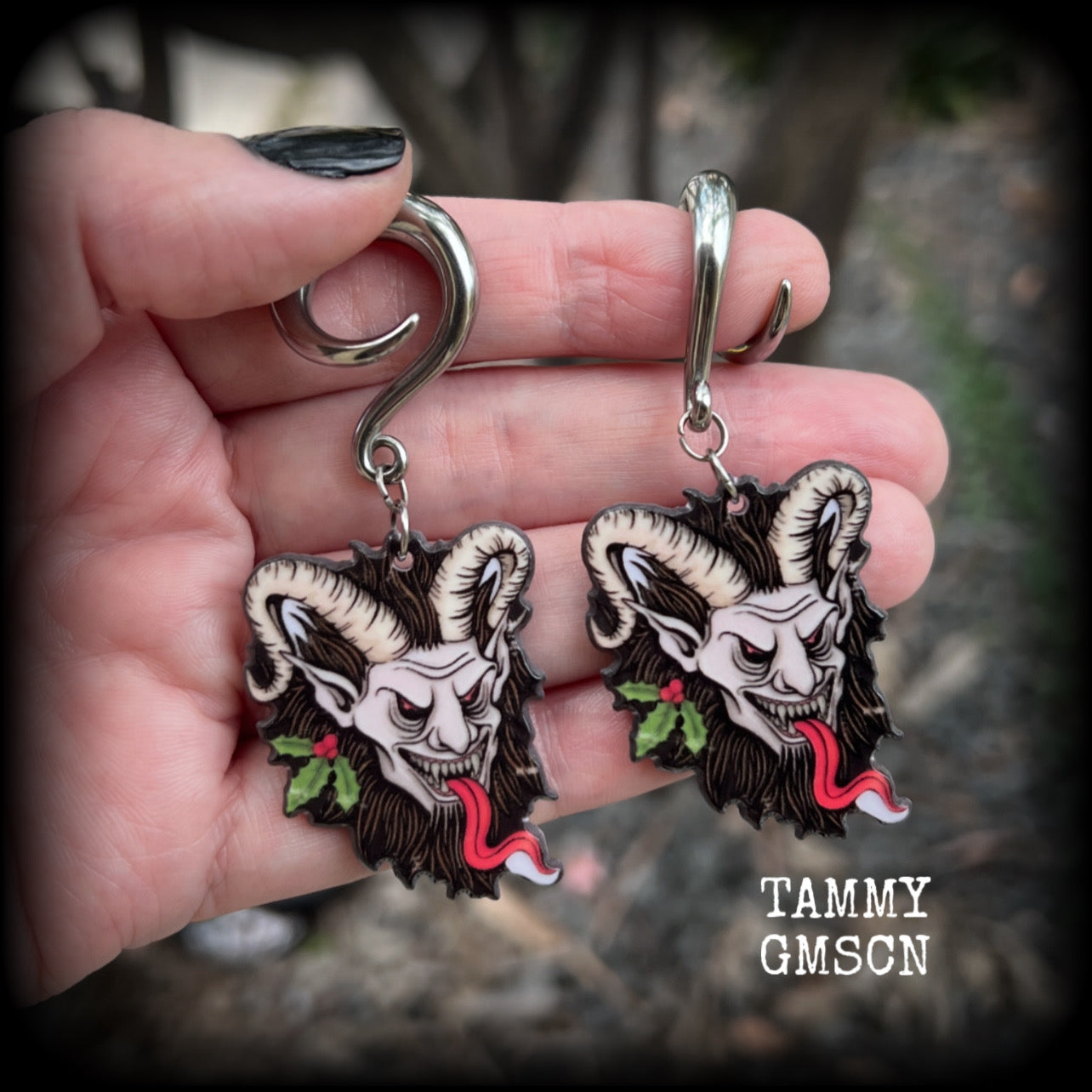 Featuring lightweight acrylic Krampus charms, these awesome gauged earrings weigh approx 10 grams each, and are lovely and dangly at just on 7cms from tip to tip.  This pair has been made on 2 gauge (6mm) surgical steel full curl hooks, to be worn in stretched lobes.