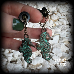 This pair of earrings features a gorgeous antique verdigris patina seahorse, measuring just over 6cms from tip to tip, and weighing 10 grams each.

This pair has been made with our chain/magnetic clasp 8mm option, suitable for stretched lobes when worn with silicone earlets or tunnels from 0 gauge (8mm).