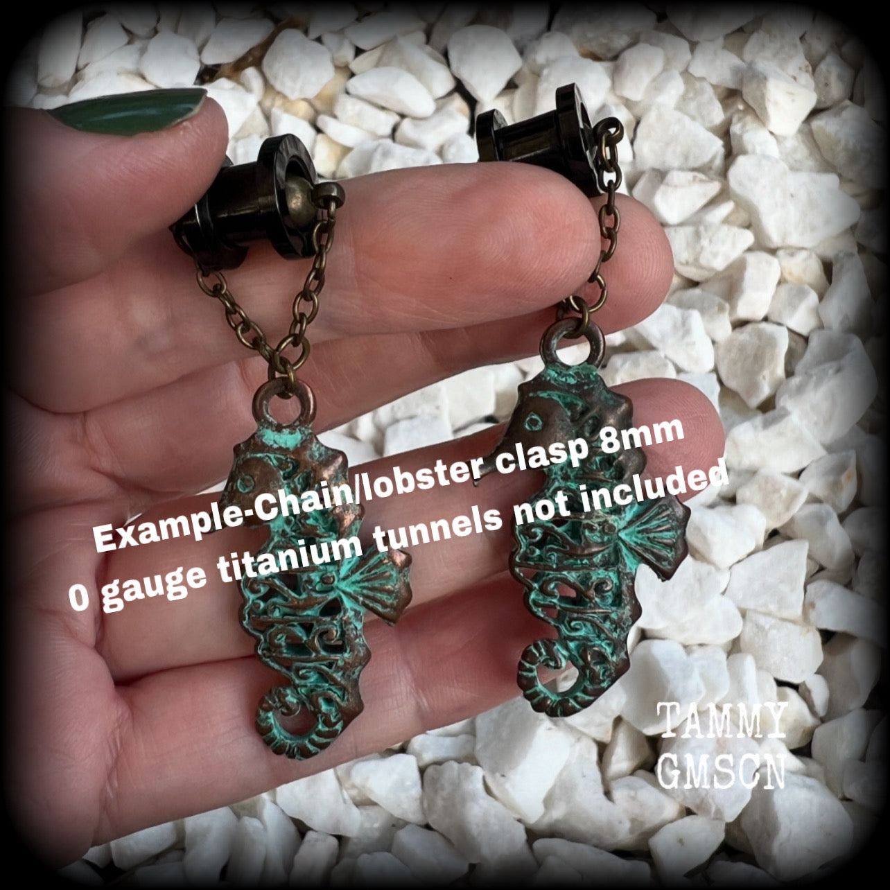 This pair of earrings features a gorgeous antique verdigris patina seahorse, measuring just over 6cms from tip to tip, and weighing 10 grams each.

This pair has been made with our chain/magnetic clasp 8mm option, suitable for stretched lobes when worn with silicone earlets or tunnels from 0 gauge (8mm).