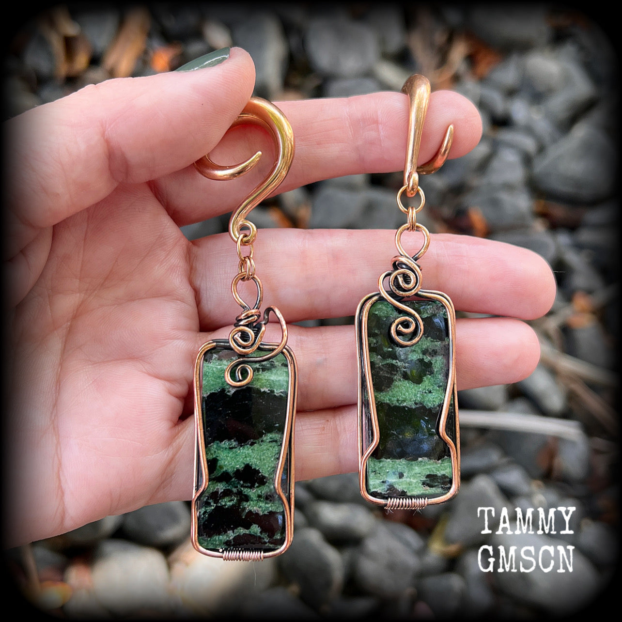 These beautiful steampunk inspired gauged earrings feature gorgeous big rustic wire wrapped ruby zoisite gemstones, measuring 9.5cms from tip to tip, and weighing approx 20 grams each.

This pair has been made on 2 gauge (6mm) titanium coated surgical steel full curl hooks, suitable for stretched lobes.