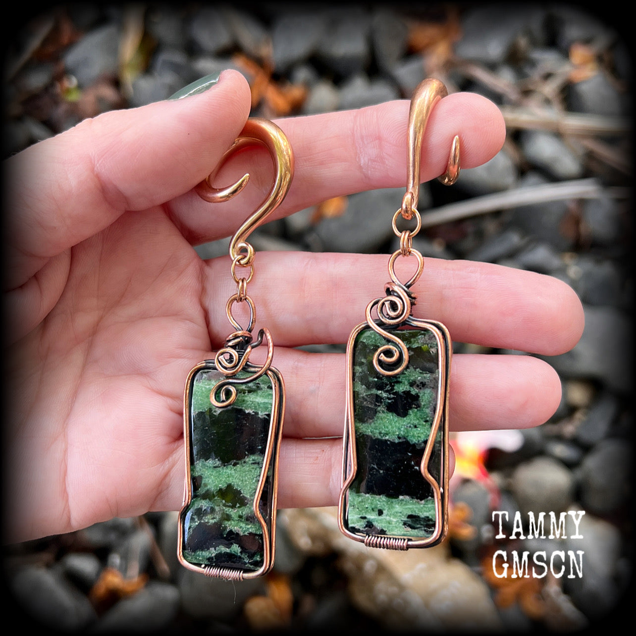 These beautiful steampunk inspired gauged earrings feature gorgeous big rustic wire wrapped ruby zoisite gemstones, measuring 9.5cms from tip to tip, and weighing approx 20 grams each.

This pair has been made on 2 gauge (6mm) titanium coated surgical steel full curl hooks, suitable for stretched lobes.