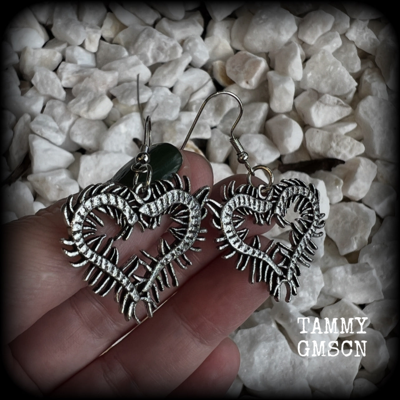 These awesome earrings feature lightweight love heart centipedes, weighing only 5 grams each and measuring approx 5cms from tip to tip.

This pair have been made on stainless steel french hooks, to be worn through pierced ears.