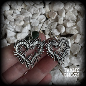 These awesome earrings feature lightweight love heart centipedes, weighing only 5 grams each and measuring approx 5cms from tip to tip.

This pair have been made on stainless steel french hooks, to be worn through pierced ears.
