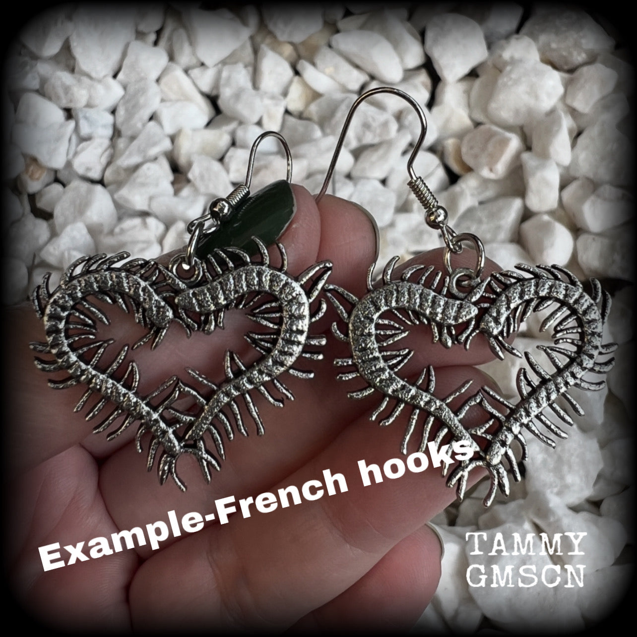 These awesome earrings feature lightweight love heart centipedes, weighing only 5 grams each and measuring approx 5cms from tip to tip.

This pair have been made on stainless steel french hooks, to be worn through pierced ears.