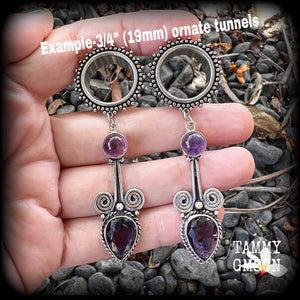 These gorgeous tunnel earrings have been made with beautiful polished and facet amethyst gemstones and antique silver boho settings.
These earrings are beautifully light weight, weighing approx 13 grams each and measure just under 8cms from tip to tip.

This pair have been made with 3/4" gauge (19mm) ornate surgical steel screw fit tunnels.