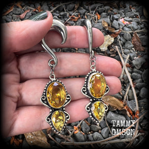 Made with gorgeous facet yellow citrine gemstones, lovely and dangly at just under 8 from tip to tip, and weighing approx 15 grams each.
These earrings have been made on 0 gauge (8mm) surgical steel half curl hooks, to be worn in stretched lobes.