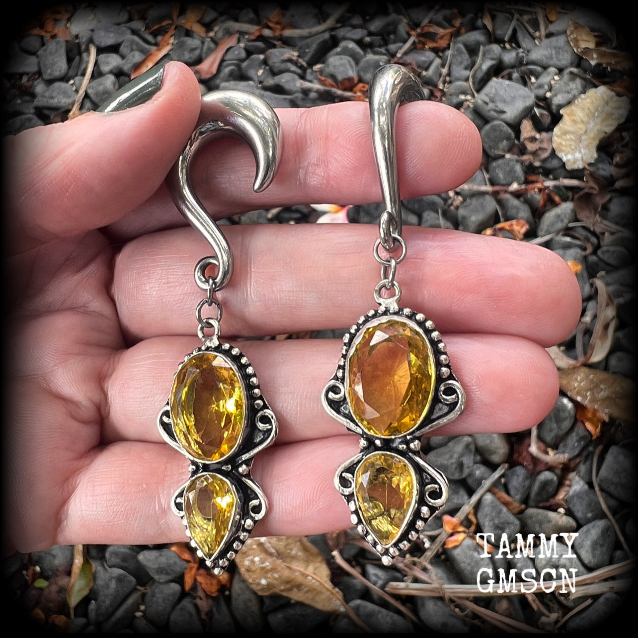 Made with gorgeous facet yellow citrine gemstones, lovely and dangly at just under 8 from tip to tip, and weighing approx 15 grams each.
These earrings have been made on 0 gauge (8mm) surgical steel half curl hooks, to be worn in stretched lobes.