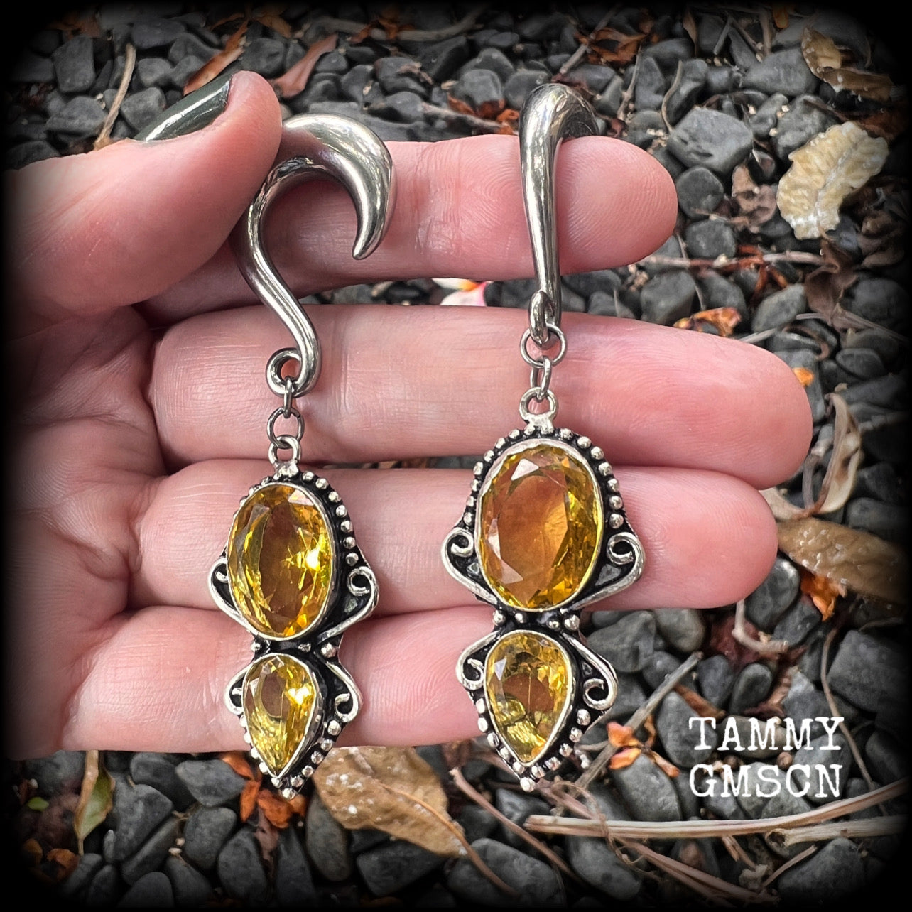 Made with gorgeous facet yellow citrine gemstones, lovely and dangly at just under 8 from tip to tip, and weighing approx 15 grams each.
These earrings have been made on 0 gauge (8mm) surgical steel half curl hooks, to be worn in stretched lobes.