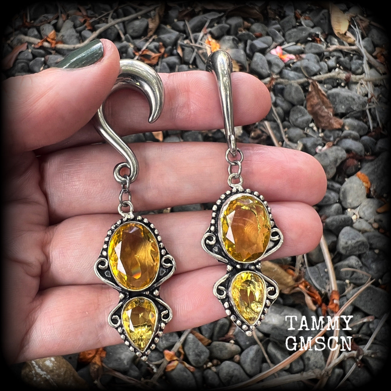 Made with gorgeous facet yellow citrine gemstones, lovely and dangly at just under 8 from tip to tip, and weighing approx 15 grams each.
These earrings have been made on 0 gauge (8mm) surgical steel half curl hooks, to be worn in stretched lobes.