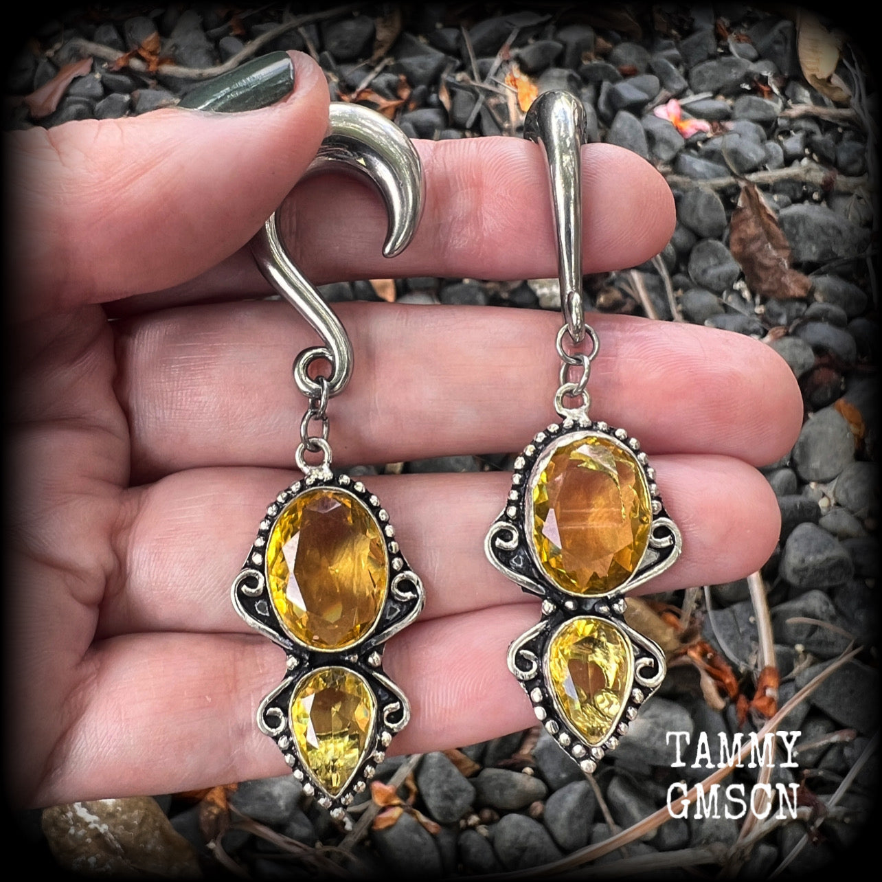 Made with gorgeous facet yellow citrine gemstones, lovely and dangly at just under 8 from tip to tip, and weighing approx 15 grams each.
These earrings have been made on 0 gauge (8mm) surgical steel half curl hooks, to be worn in stretched lobes.