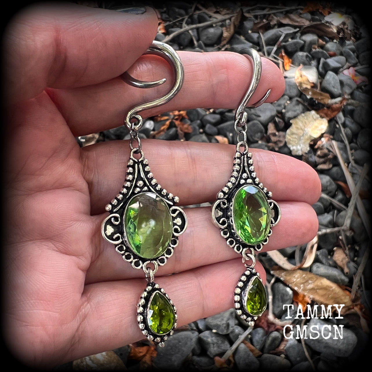 This pairof Peridot and antique silver gauged earrings weigh approx 9 grams a piece, nice and lightweight, and measuring approx 8cms from tip to tip.
These have been made on 6 gauge (4mm) surgical steel full curl hooks, to be worn in stretched lobes.