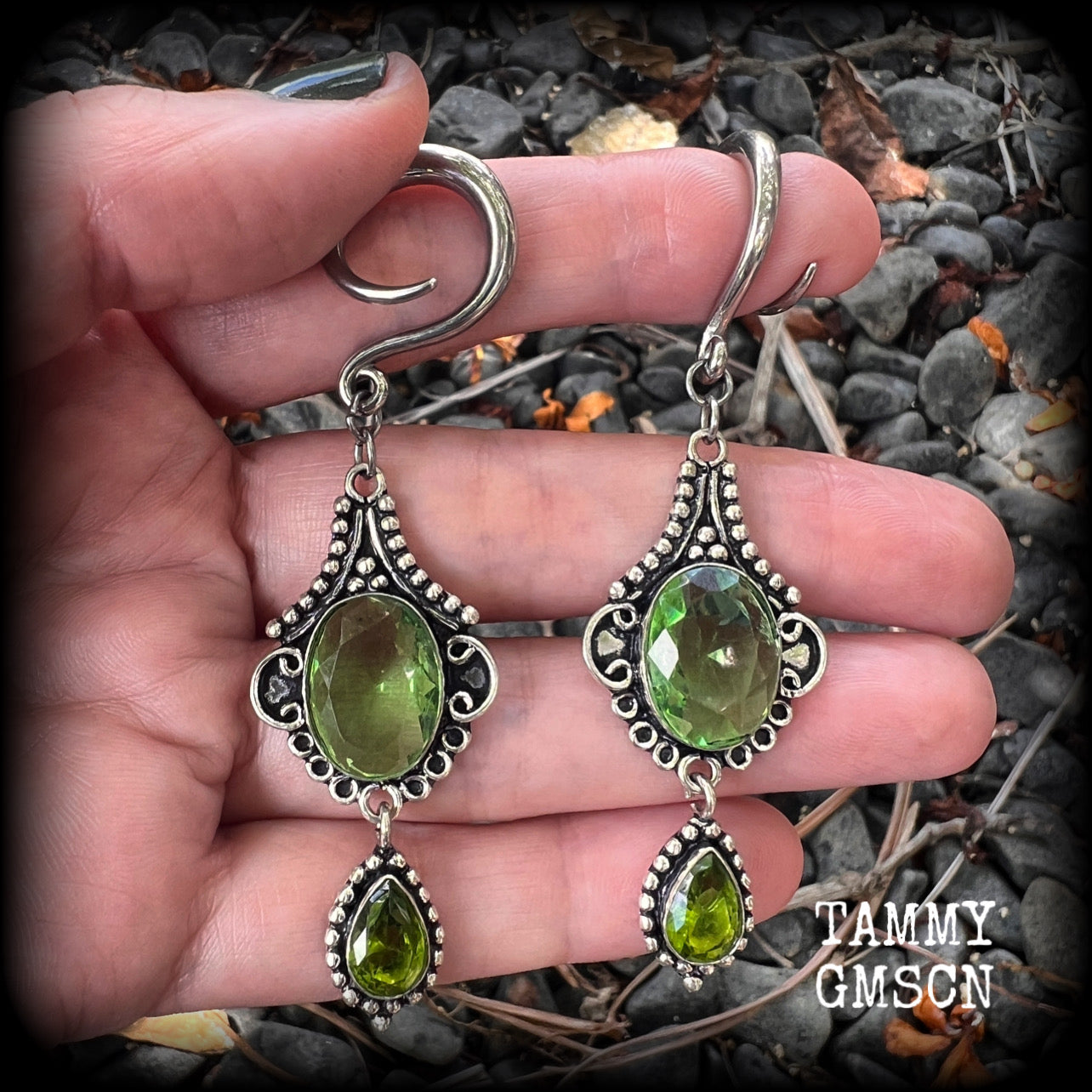 This pairof Peridot and antique silver gauged earrings weigh approx 9 grams a piece, nice and lightweight, and measuring approx 8cms from tip to tip.
These have been made on 6 gauge (4mm) surgical steel full curl hooks, to be worn in stretched lobes.