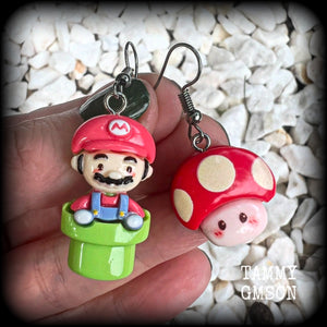 This is a super cute 3pc mix and match set of Mario Bros earrings featuring classic Mario brothers we all know and love, measuring between 4 and 5cms from tip to tip, and weighing only a few grams each.

This 3pcs mix and match set have been made with stainless steel french hooks, to be worn in pierced ears