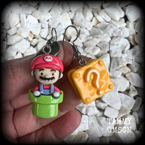 This is a super cute 3pc mix and match set of Mario Bros earrings featuring classic Mario brothers we all know and love, measuring between 4 and 5cms from tip to tip, and weighing only a few grams each.

This 3pcs mix and match set have been made with stainless steel french hooks, to be worn in pierced ears