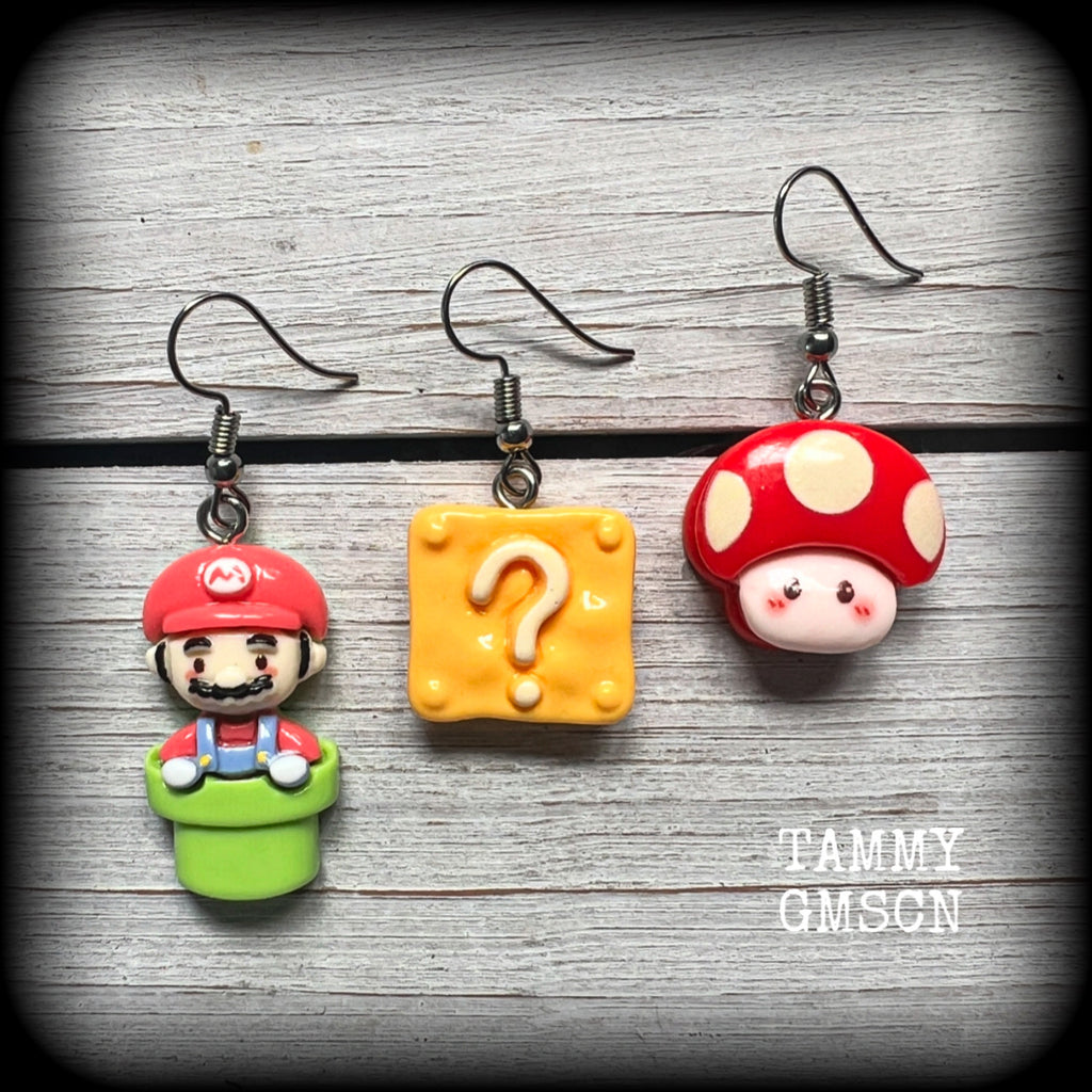 This is a super cute 3pc mix and match set of Mario Bros earrings featuring classic Mario brothers we all know and love, measuring between 4 and 5cms from tip to tip, and weighing only a few grams each.

This 3pcs mix and match set have been made with stainless steel french hooks, to be worn in pierced ears