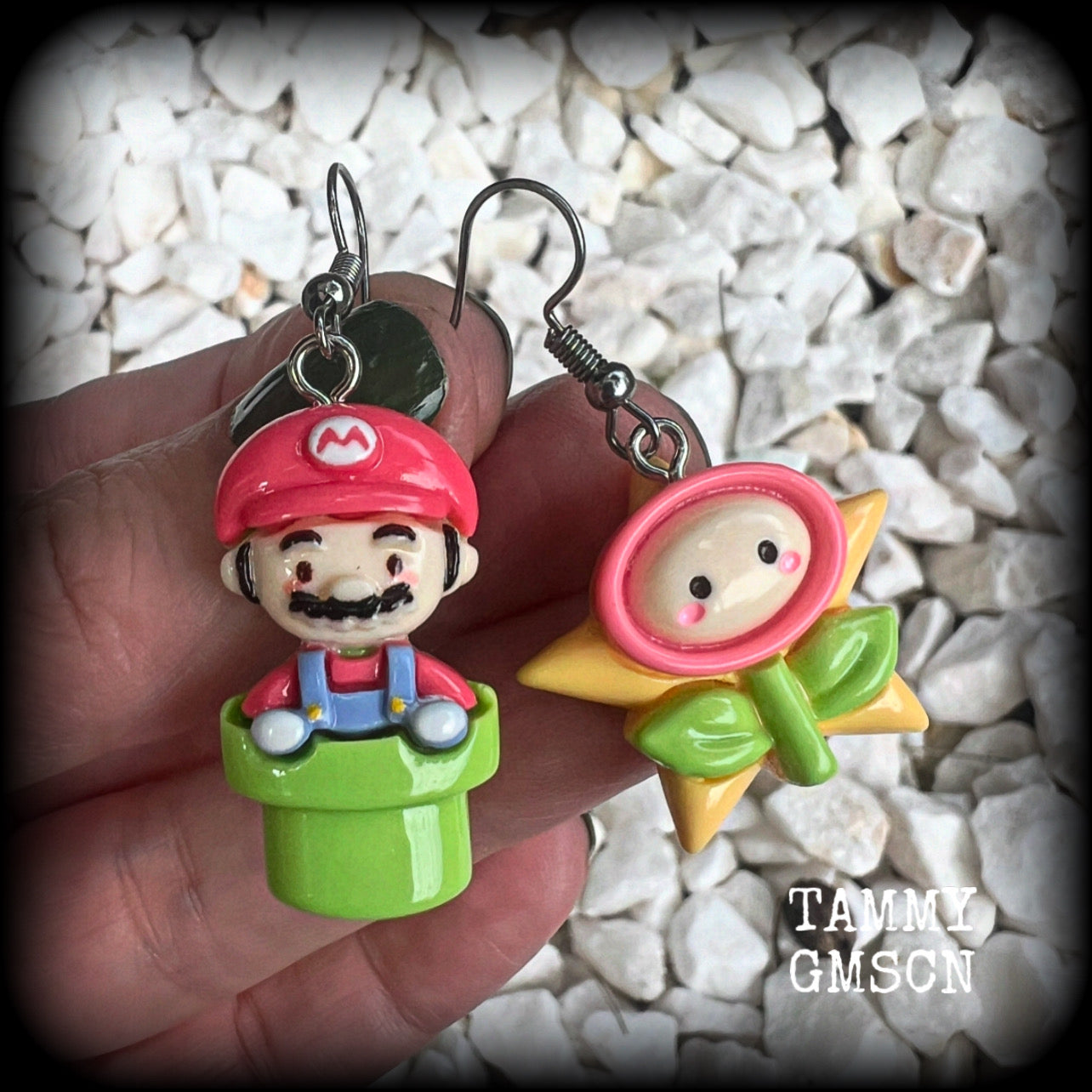 This is a super cute 3pc mix and match set of Mario Bros earrings featuring classic Mario brothers we all know and love, measuring between 4 and 5cms from tip to tip, and weighing only a few grams each.

This 3pcs mix and match set have been made with stainless steel french hooks, to be worn in pierced ears.