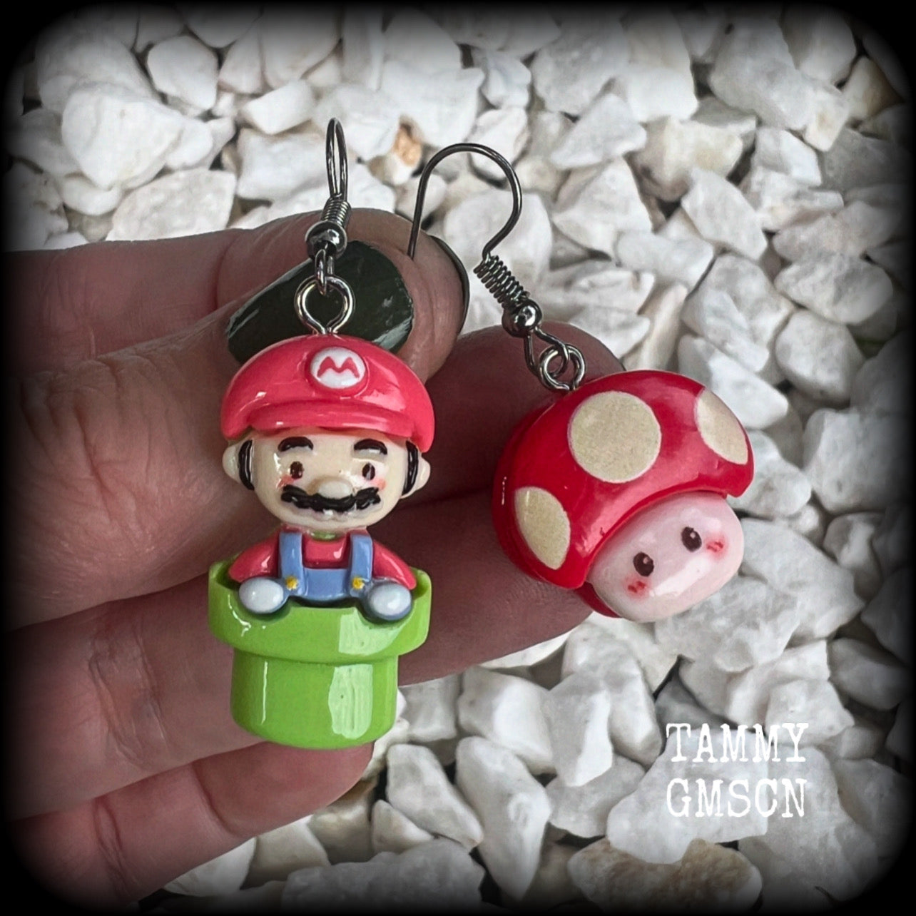 This is a super cute 3pc mix and match set of Mario Bros earrings featuring classic Mario brothers we all know and love, measuring between 4 and 5cms from tip to tip, and weighing only a few grams each.

This 3pcs mix and match set have been made with stainless steel french hooks, to be worn in pierced ears.